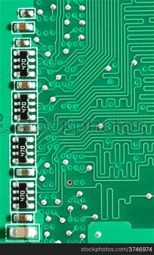 Green circuit board with components