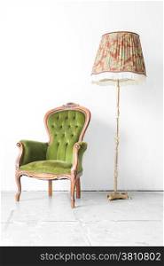 Green classical style Armchair sofa couch in vintage room with desk lamp