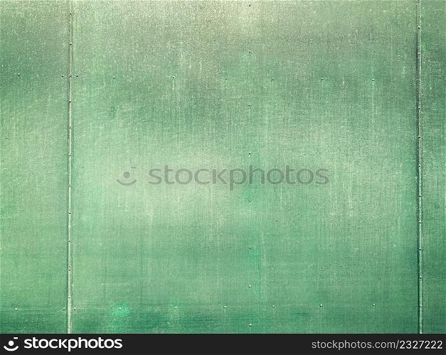 Green concrete wall texture and background with copy space