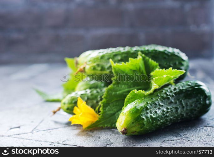 green cucumber on the gray table, fresh cucumber