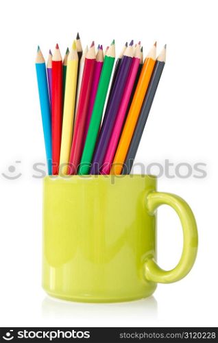 green cup with pencils on a white background