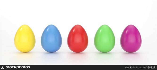 Green, cyan and pink colored Easter eggs balanced on its blunt end on white background with wide copy space