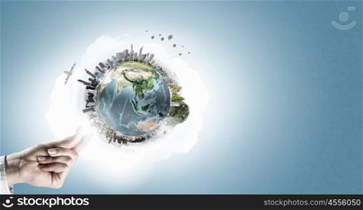 Green Earth planet concept. Close up of human hands holding Earth planet. Elements of this image are furnished by NASA