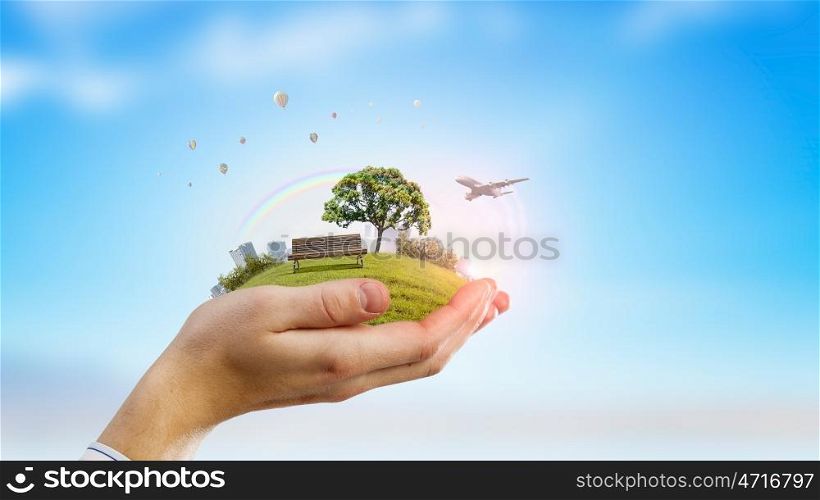 Green eco planet. Close up of hand holding green tree concept