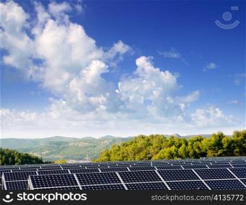 green energy solar plates to provide mountain valley village