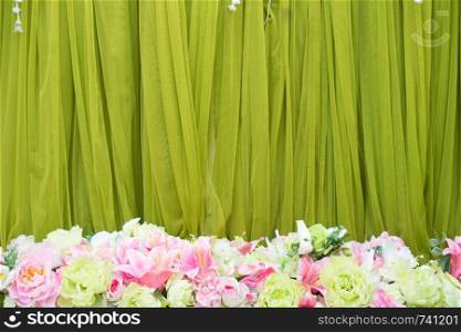 Green fabric pattern with beautiful flower for event backdrop