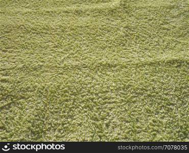 green fabric texture background. green carpet fabric texture useful as a background