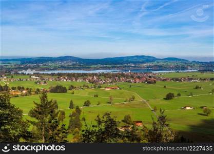 Green fields  next to Neuschwanstein castle in Germany