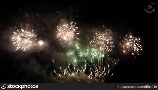 Green Firework celebrate anniversary happy new year 2022, 4th of july holiday festival. Green firework in night time celebrate national holiday. Countdown to new year 2022 festival party time event