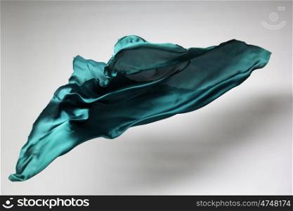 green flying fabric - art object, design element