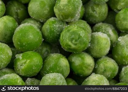 Green frozen peas. Green frozen raw peas vegetable for background