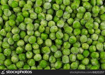 Green frozen raw peas vegetable for background