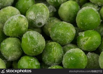 Green frozen raw peas vegetable for background