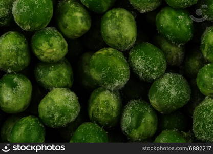 Green frozen raw peas vegetable for background