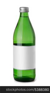 Green glass bottle of sparkling water isolated on white