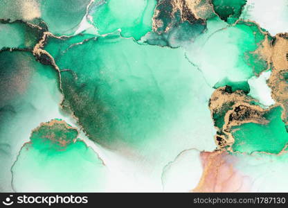 Green gold abstract background of marble liquid ink art painting on paper . Image of original artwork watercolor alcohol ink paint on high quality paper texture .. Green gold abstract background of marble liquid ink art painting on paper .