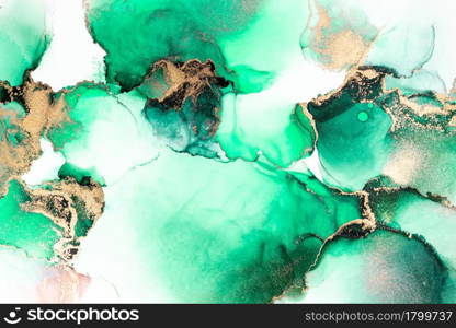 Green gold abstract background of marble liquid ink art painting on paper . Image of original artwork watercolor alcohol ink paint on high quality paper texture .. Green gold abstract background of marble liquid ink art painting on paper .