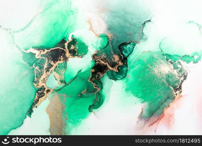 Green gold abstract background of marble liquid ink art painting on paper . Image of original artwork watercolor alcohol ink paint on high quality paper texture .. Green gold abstract background of marble liquid ink art painting on paper .