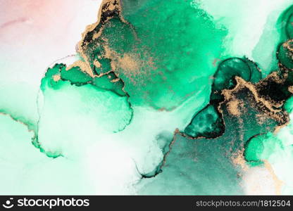 Green gold abstract background of marble liquid ink art painting on paper . Image of original artwork watercolor alcohol ink paint on high quality paper texture .. Green gold abstract background of marble liquid ink art painting on paper .