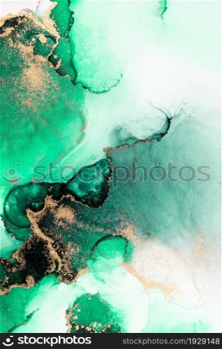 Green gold abstract background of marble liquid ink art painting on paper . Image of original artwork watercolor alcohol ink paint on high quality paper texture .. Green gold abstract background of marble liquid ink art painting on paper .