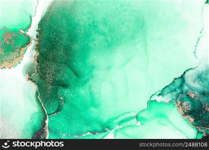 Green gold abstract background of marble liquid ink art painting on paper . Image of original artwork watercolor alcohol ink paint on high quality paper texture .. Green gold abstract background of marble liquid ink art painting on paper .