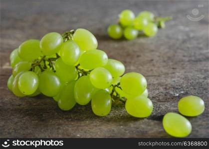 green grapes. fresh green grape on old wooden background