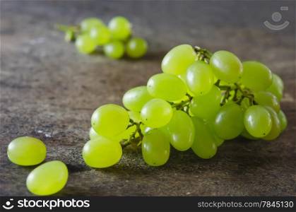 green grapes. fresh green grape on old wooden background