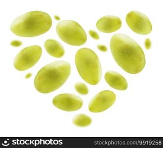 Green grapes in the shape of a heart on a white background.. Green grapes in the shape of a heart on a white background