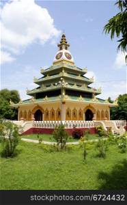 Green grass and pagoda in Mingun, Mandalay, Myanmar