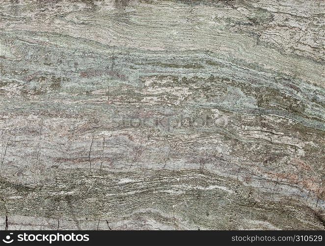 Green grunge stone texture background with white cracks