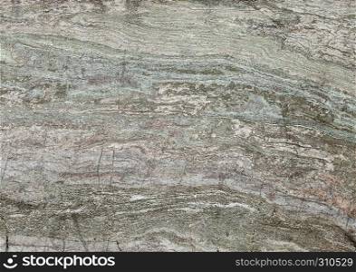 Green grunge stone texture background with white cracks