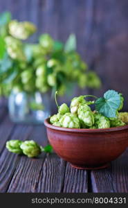 green hope in bowl and on a table