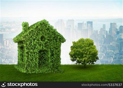 Green house and tree in ecologic living concept - 3d rendering