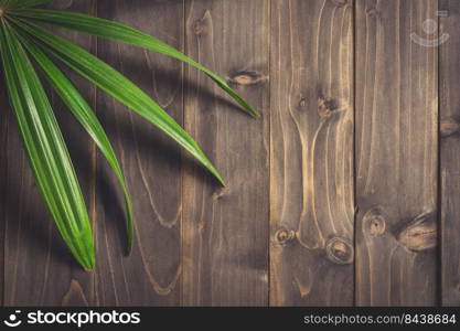 Green Ieaf background around old wood with space, Vintage toned.