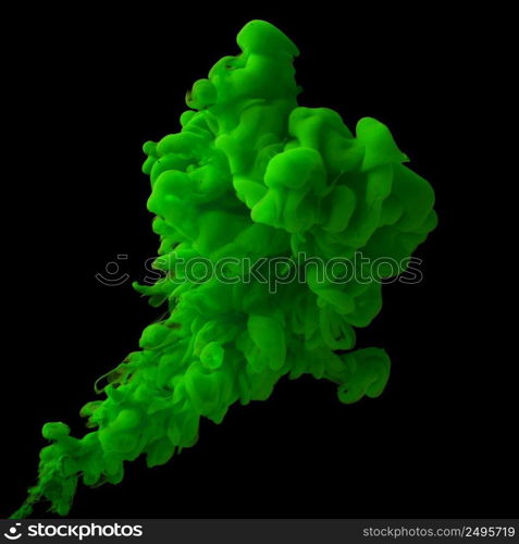 Green ink cloud in water isolated on black background