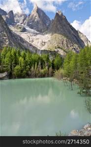 Green lake in Mont Blanc massif, Italy.