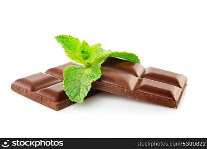 Green leaf of mint with dark chocolate isolated on white