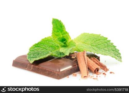 Green leaf of mint with dark chocolate isolated on white