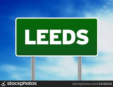 Green Leeds, England highway sign on Cloud Background.