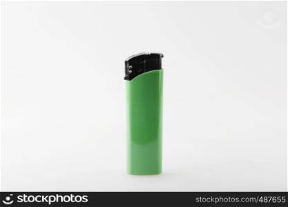 Green Lighter Against White Background