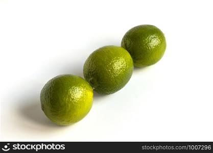 Green Lime Isolated Fruit Set. Whole lemon Citrus. Fresh Organic Limes for Citric Coclatil or Lemonade. Group of Raw Vegetarian Diet Lime. Clipping path on White Background. Juicy Vitamin Plant. Green Lime Isolated Fruit Set. Whole lemon Citrus