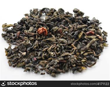 green loose tea with fruits and berries