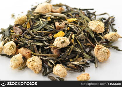 green loose tea with fruits and flowers