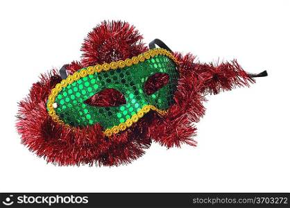 green mask and red garland on white background