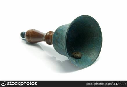 green metal and wooden bell on isolated white