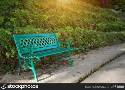 Green Metal bench in the park,stainless steel chair.