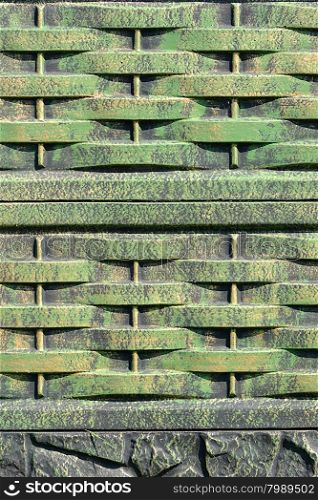 Green metal texture with patches of rust steel on its surface, taken outdoor