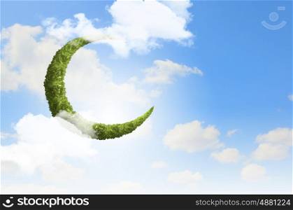 Green moon. Conceptual image of moon made of green leaves