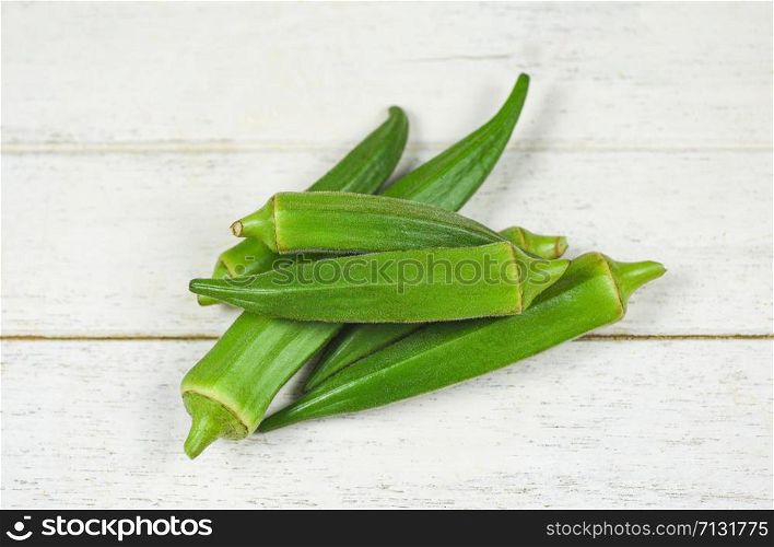 Green Okra / Fresh Fresh young okra for food on white wooden , Ochro Gumbo