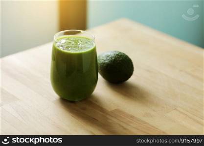 Green organic smoothie made from freshly prepared raw vegetables in a glass and whole avocado on wooden background. Vegan diet and nutrition, healthy detox, alkaline food, vegetarian concepts drinks.. Green organic smoothie made from freshly prepared raw vegetables in a glass and whole avocado on wooden background. Vegan diet and nutrition, healthy detox, alkaline food, vegetarian concepts drinks